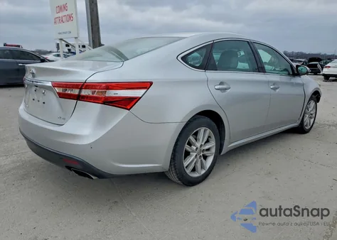 2014 Toyota Avalon Base z USA, uszkodzony, nr VIN 4T1BK1EB9EU087637